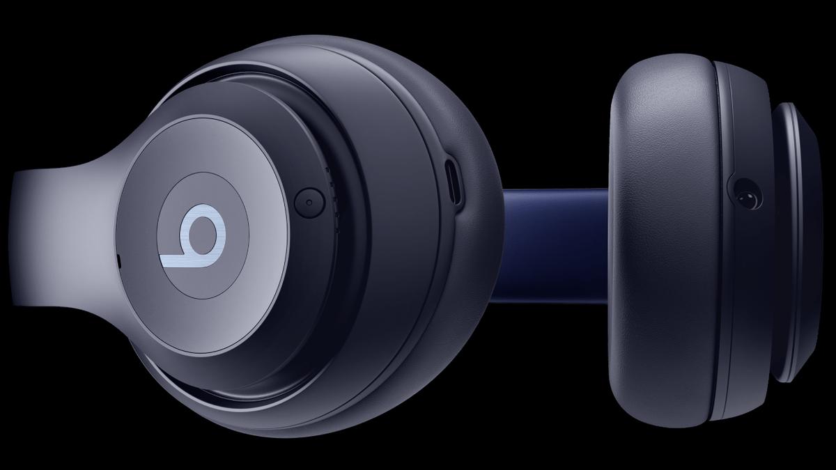 Beats Studio Pro navy blue — USB-C port visible on ear cup for lossless wired audio
