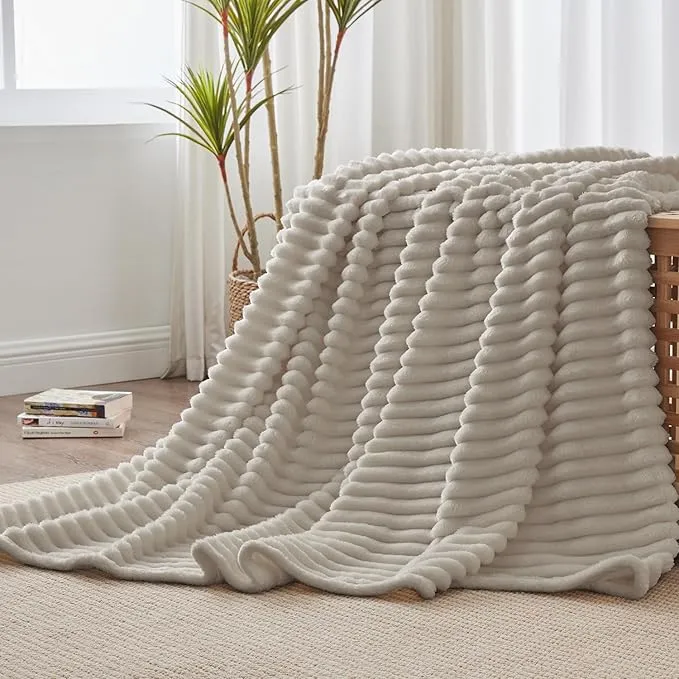 Ribbed fuzzy throw blanket on a couch